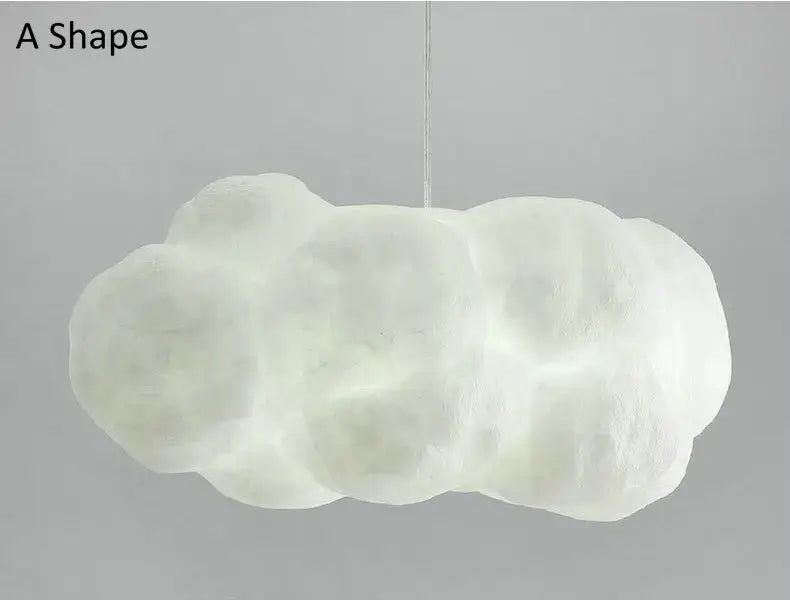 A soft off-white fabric cloud chandelier by decorbites made of cotton hanging light for bedroom decor