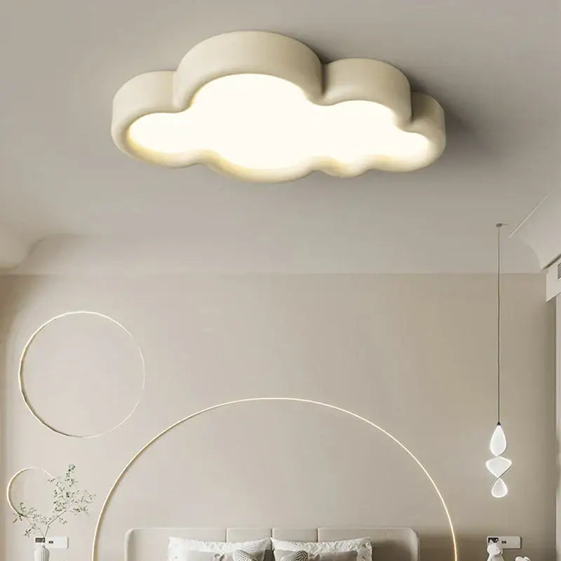 Cream-colored cloud led chandelier by decorbites with natural wood and soft diffused glow for child room lighting