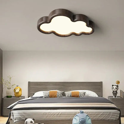 A warm decorbites cloud led chandelier with natural dark wood finish and soft glow for child room lighting