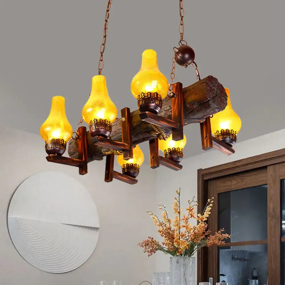 DecorBites coastal brown island pendant lamp with rustic wooden log, amber brass accents, and yellow crackle glass shade