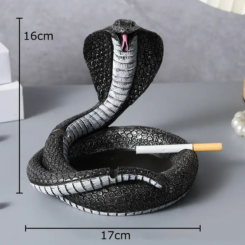 Black and silver cobra ashtray with detailed scales and pink tongue made of resin decorbites cobra ashtray office accessory