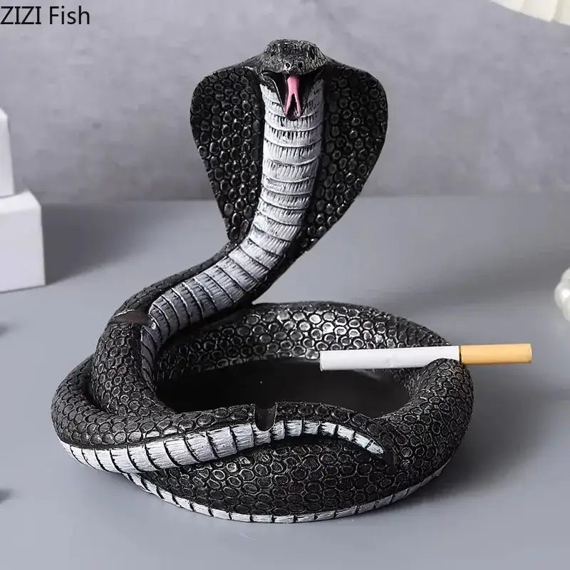 Decorbites cobra ashtray in black and silver resin with detailed scales and raised hood for office smoking accessory