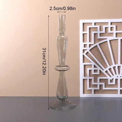 Tall transparent glass vase with slender stem and flared base for stylish home decor by decorbites