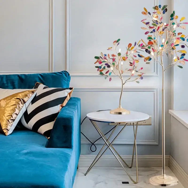 A tall slender floor lamp with a golden base and colorful agate chandelier leaves for dining room and bedroom decorbites colorful