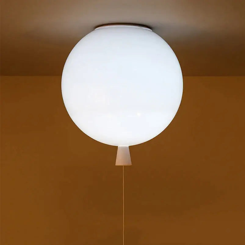 A sleek frosted white spherical ceiling light with a minimalist stem base from decorbites colorful balloon collection