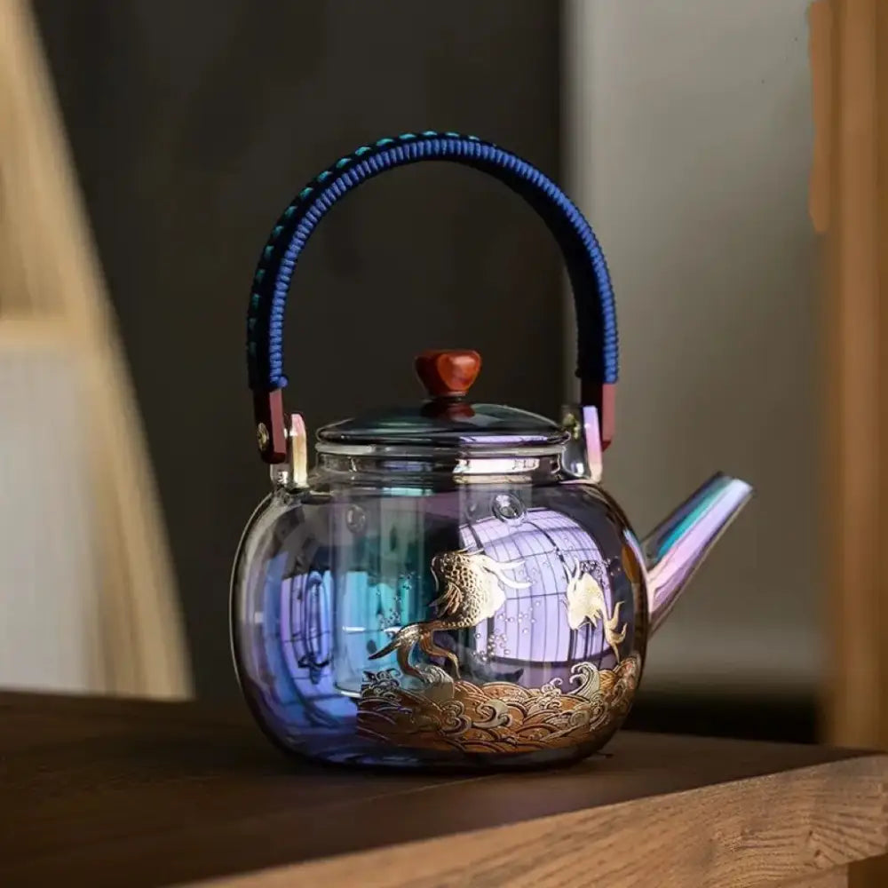 Decorbites colorful enamel glass teapot with translucent iridescent body blue handle gold-leafed mermaid design