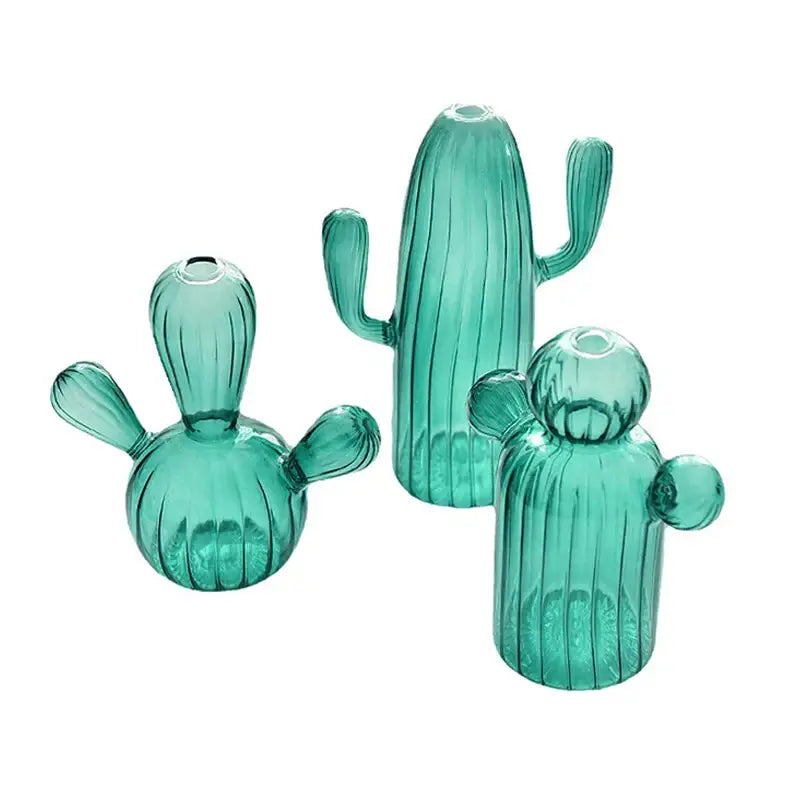 Set of three translucent teal cactus glass vases with ribbed texture and rounded arms for home decor by decorbites