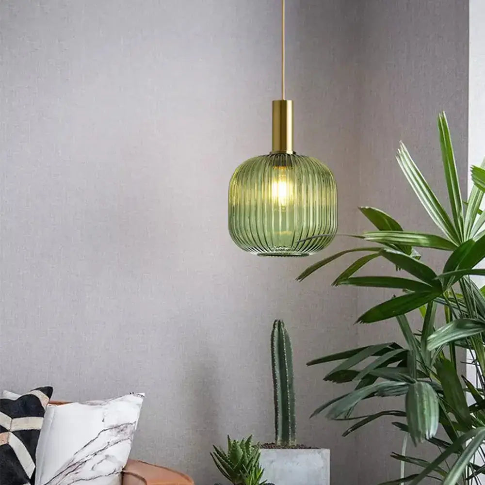 DecorBites green ribbed glass pendant lights with brass finish offer colorful glass pendant lights for retro style