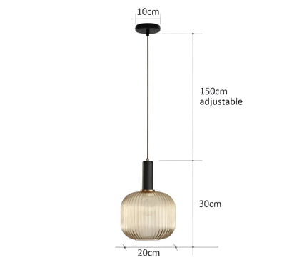 A modern decorbites™ pendant light with ribbed amber-tinted glass and black metal hardware for retro style lighting