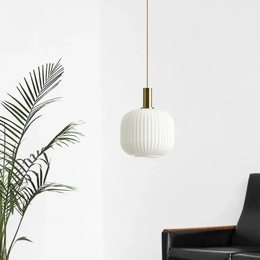 White ribbed glass pendant light with brass-finished metal fixture from decorbites colorful glass pendant lights collection