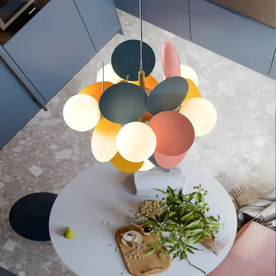 Decorbites™ colorful led branch chandelier with multi-colored circular matte shades hanging above living room table
