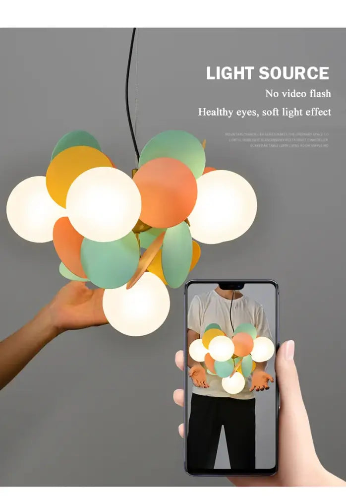 A modern decorbites colorful led branch chandelier with pastel glass orbs for living room and bedroom lighting