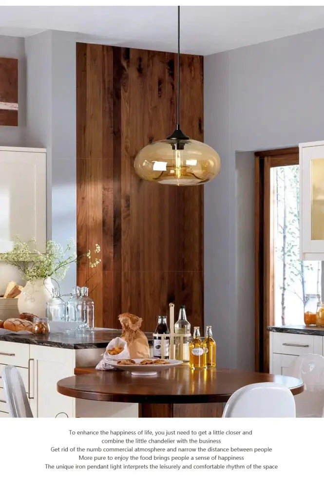 A sleek amber-tinted glass pendant light with black metal fixture from decorbites colorful led pendant lights for restaurant