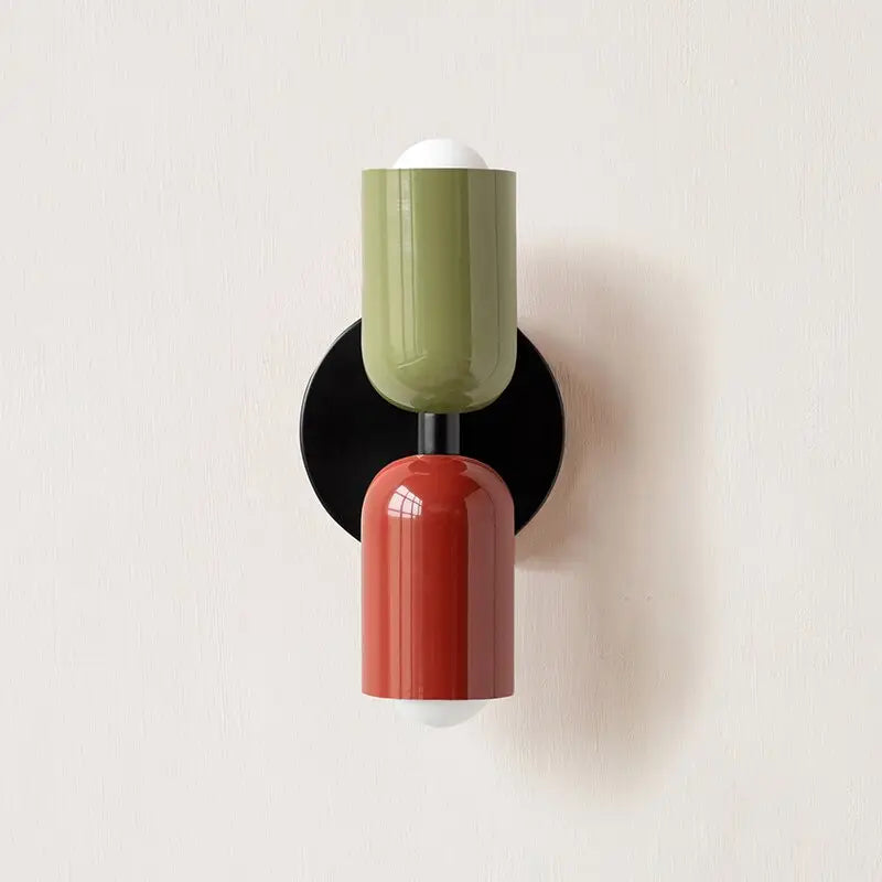 Decorbites™ colorful modern wall sconce with olive green and terracotta glass shades on a black circular base