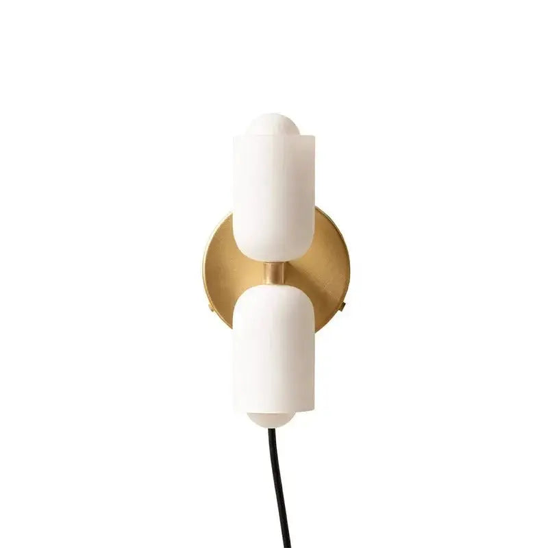 DecorBites modern wall sconce with two white matte glass shades on a circular brass backplate for elegant lighting