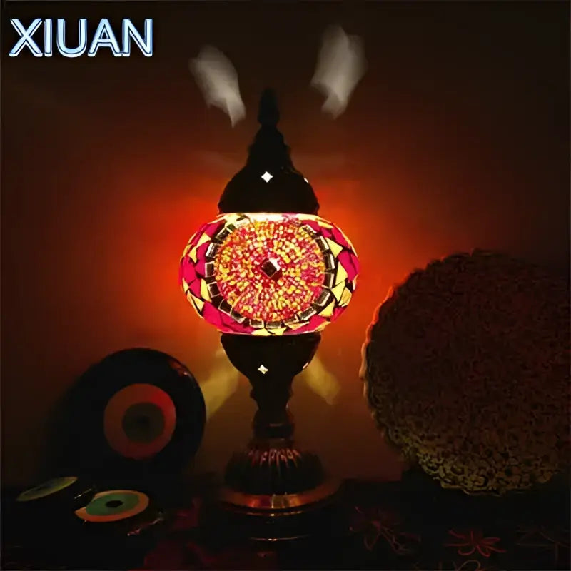 Decorbites colorful mosaic table lamp with vibrant red and gold glass tiles on a dark metal base for bedroom use
