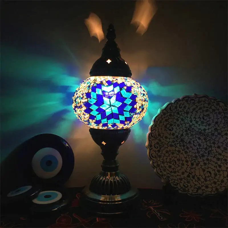 Decorbites colorful mosaic table lamp with vibrant blue and gold stained glass and black metal base for bedroom use