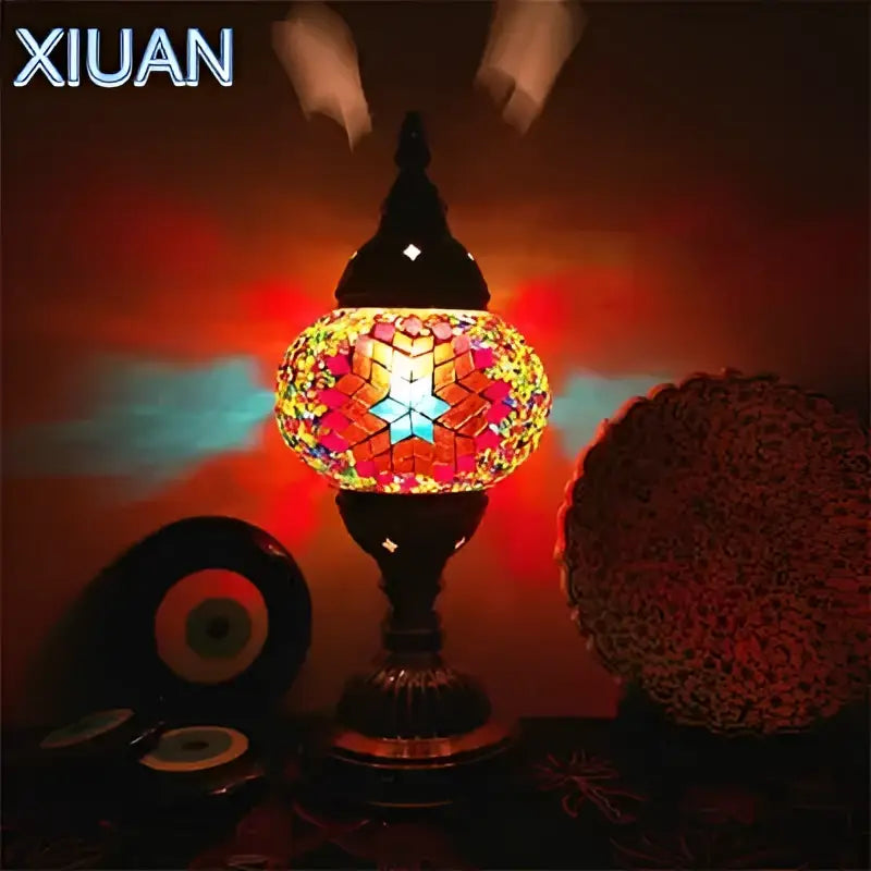 Decorbites colorful mosaic table lamp with intricate red yellow and blue stained glass tiles in a brass frame