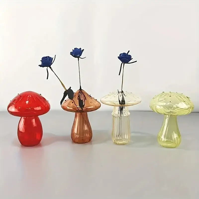 Set of four colorful glass mushroom vases in red copper clear and yellow green for home decor with textured caps