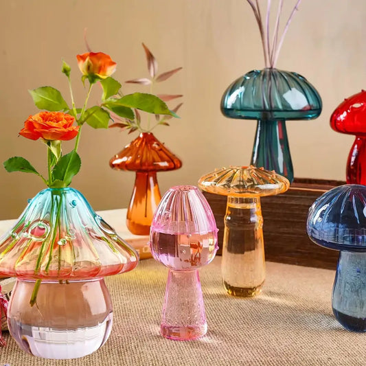DecorBites™ colorful mushroom vase made of translucent rainbow glass with blue to pink gradient and orange roses for home decor
