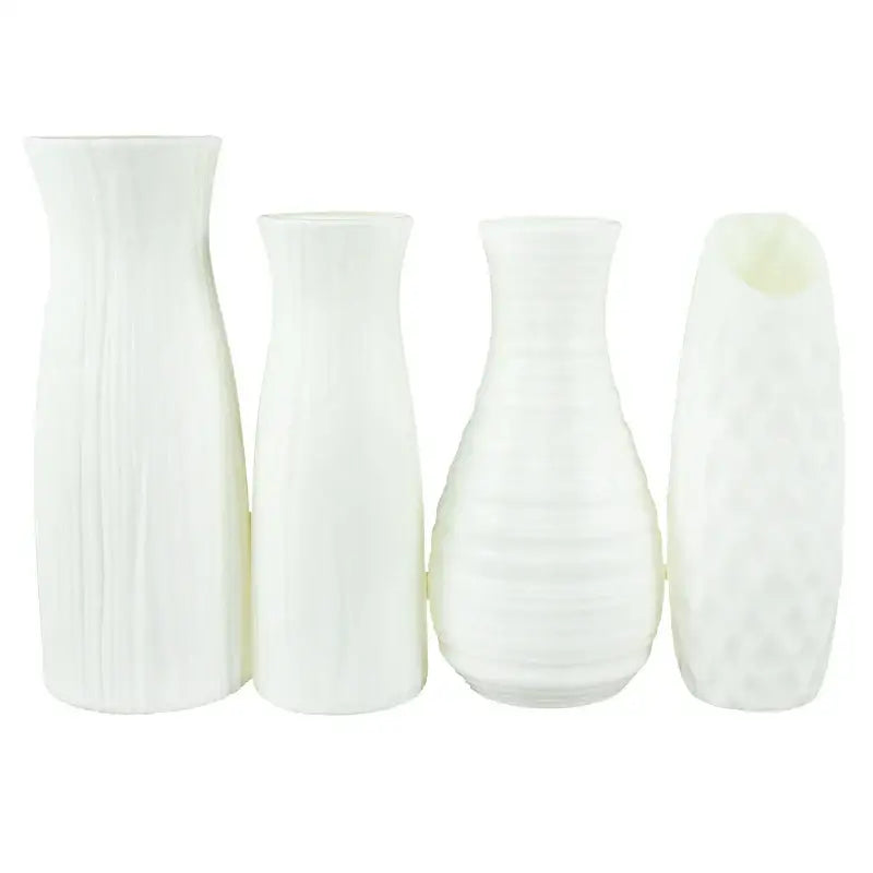 Set of four minimalist white ceramic vases with subtle texture suitable for modern flower vase decorbites colorful plastic flower use