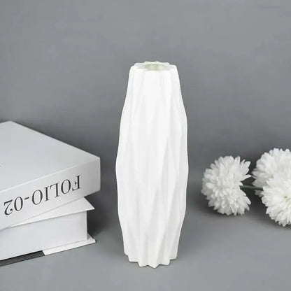White ceramic flower vase with tall slender silhouette and vertical ridges for modern home décor by decorbites