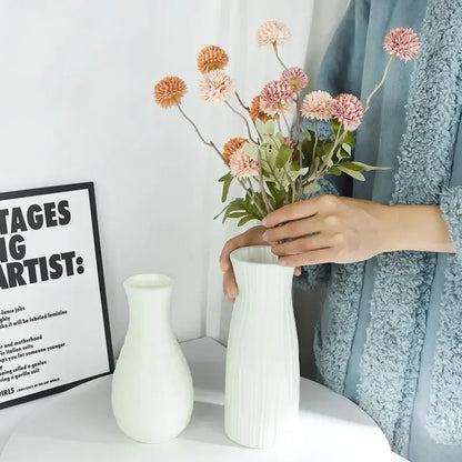 White ceramic modern flower vase with vertical ridged texture from DecorBites colorful plastic flower vase collection