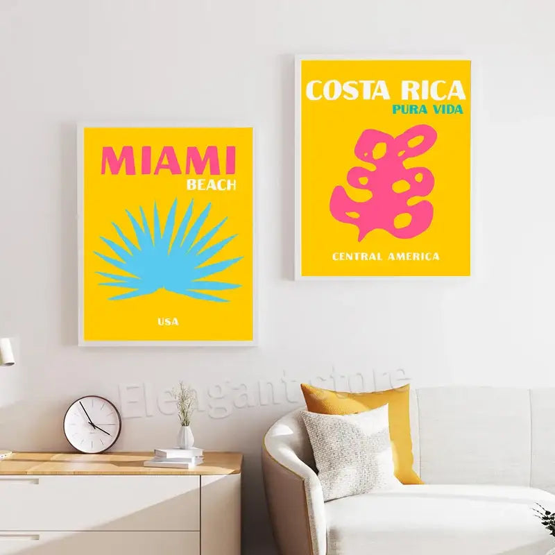 Two framed DecorBites™ colorful travel posters art print set with retro yellow backgrounds featuring Miami Beach and Costa Rica designs