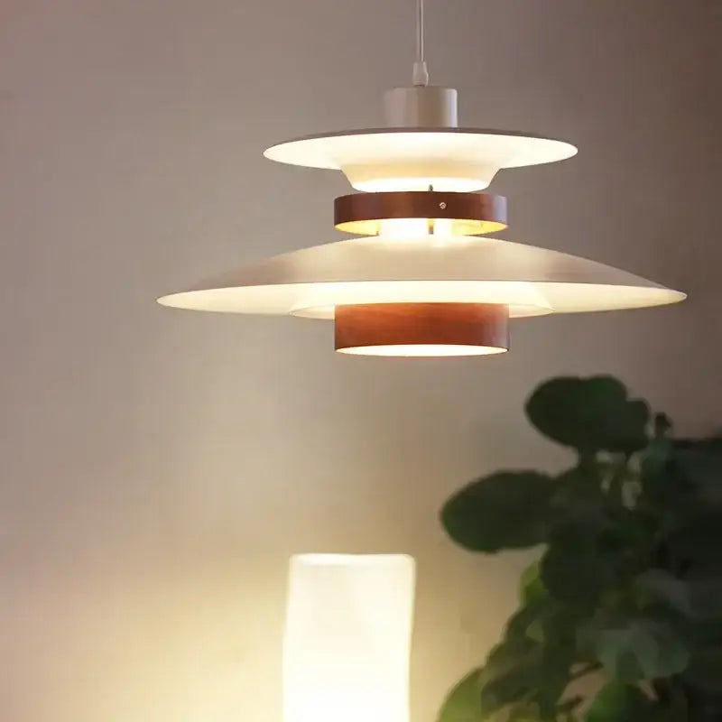 A modern decorbites colorful umbrella led chandelier with layered white shades and warm wooden rings for living rooms