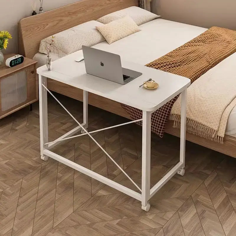 White decorbites compact foldable desk with minimalist wood top black metal frame and caster wheels for bedroom use