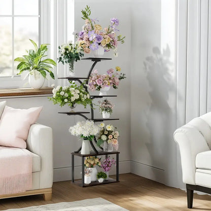 Black metal DecorBites™ compact tree plant stand with multiple shelves holding colorful floral arrangements in glass vases