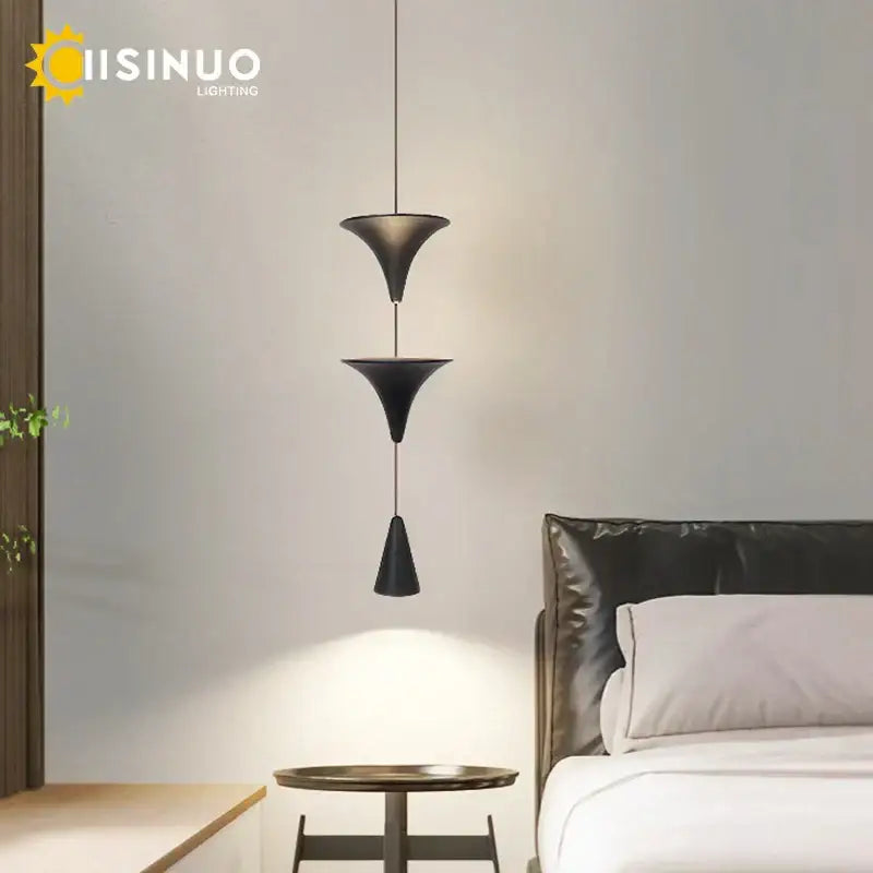 Black decorbites cone pendant light with three stacked conical shades ideal for kitchen island or bedside lighting