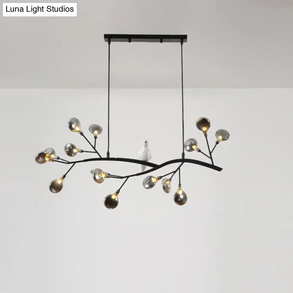 Black metal branch style chandelier with frosted glass globes and bird decoration suitable for 220v-240v lighting