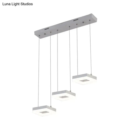 Modern silver acrylic square island light pendant fixture with three white natural acrylic square shades for kitchen use