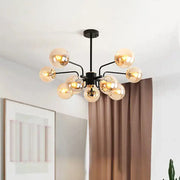 DecorBites contemporary black metal chandelier with amber glass globe shades 10-bulb sphere living room pendant light