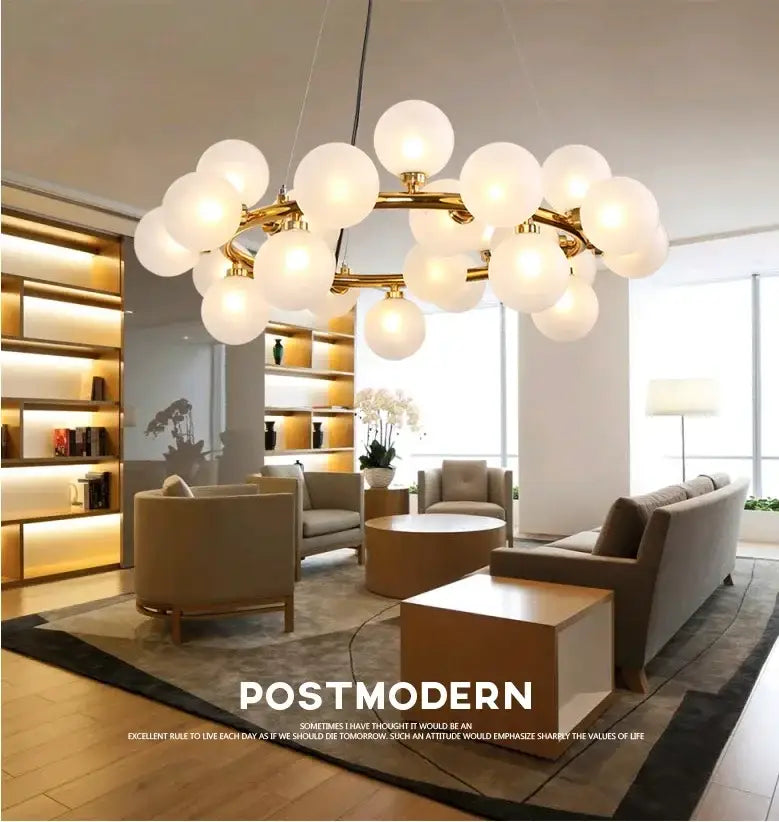 Gold-toned decorbites™ contemporary chandelier with multiple white glass ball lights and frosted glass globes