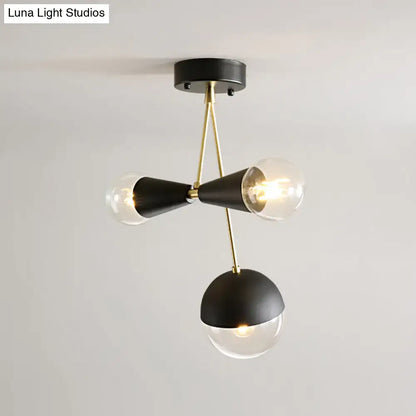 DecorBites contemporary black hourglass semi flush ceiling light with brass arms and three clear glass bulbs