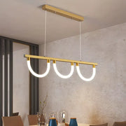 Modern gold-toned rectangular decorbites™ contemporary island lamp with three glowing white led elements suspended by thin cords