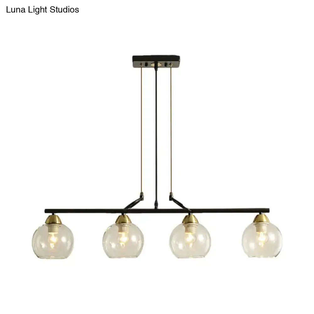 DecorBites contemporary black metal chandelier with four clear prismatic glass globes and brass accents for dining hall