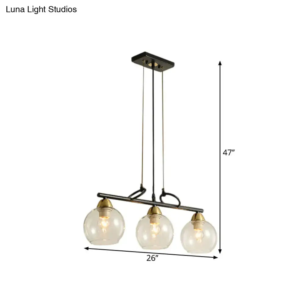 DecorBites™ black metal pendant light with brass accents and clear prismatic glass globes for dining hall lighting