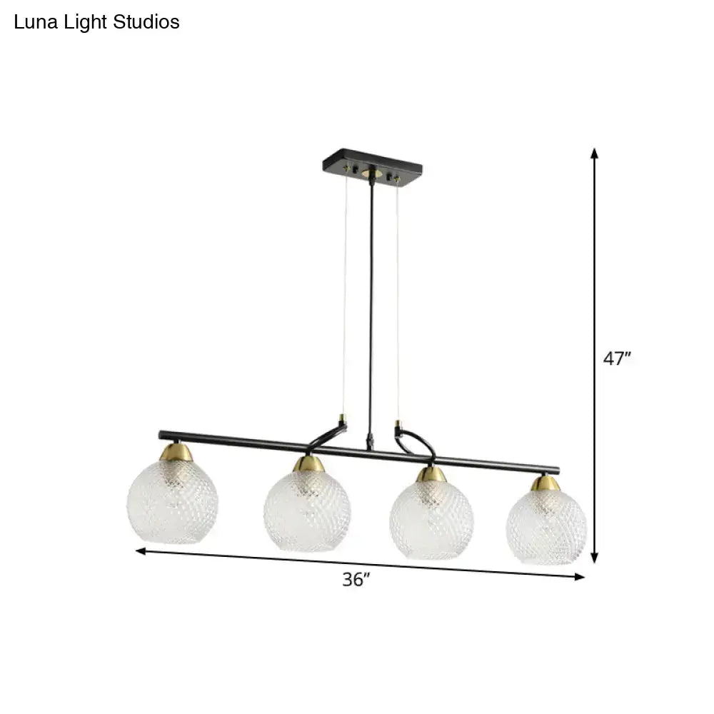 Decorbites contemporary black metal bar pendant light with four clear prismatic glass globes and brass accents for dining hall