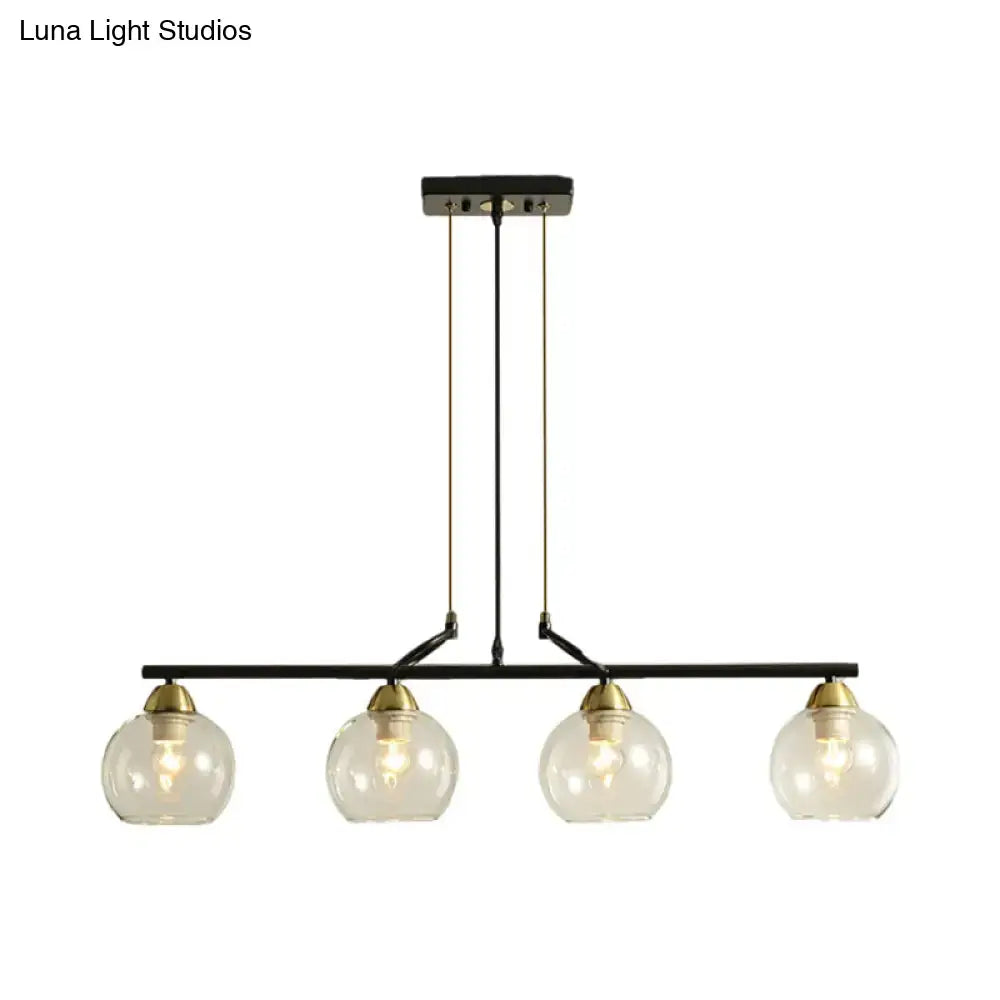 DecorBites™ contemporary black metal chandelier with four clear prismatic glass globes and brass accents for dining hall