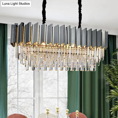 DecorBites contemporary black prismatic crystal oval island pendant light features black and gold panels for dining room