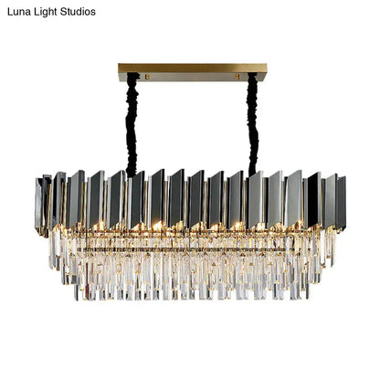 Modern rectangular chandelier with gold metal frame black mirrored panels and clear crystals for dining room decor