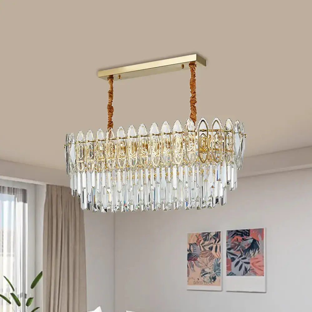 Elegant gold-toned DecorBites™ contemporary clear crystal kitchen hanging light with cascading prisms and braided rope suspension