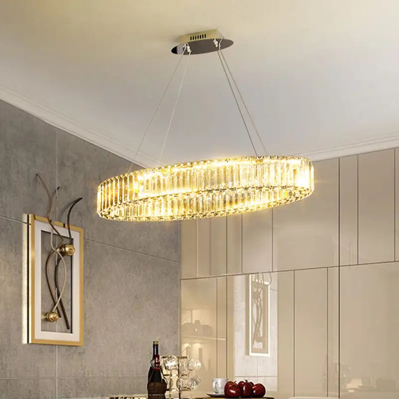 DecorBites™ contemporary circular gold chandelier with clear crystal prisms and stepless dimming for dining table lighting