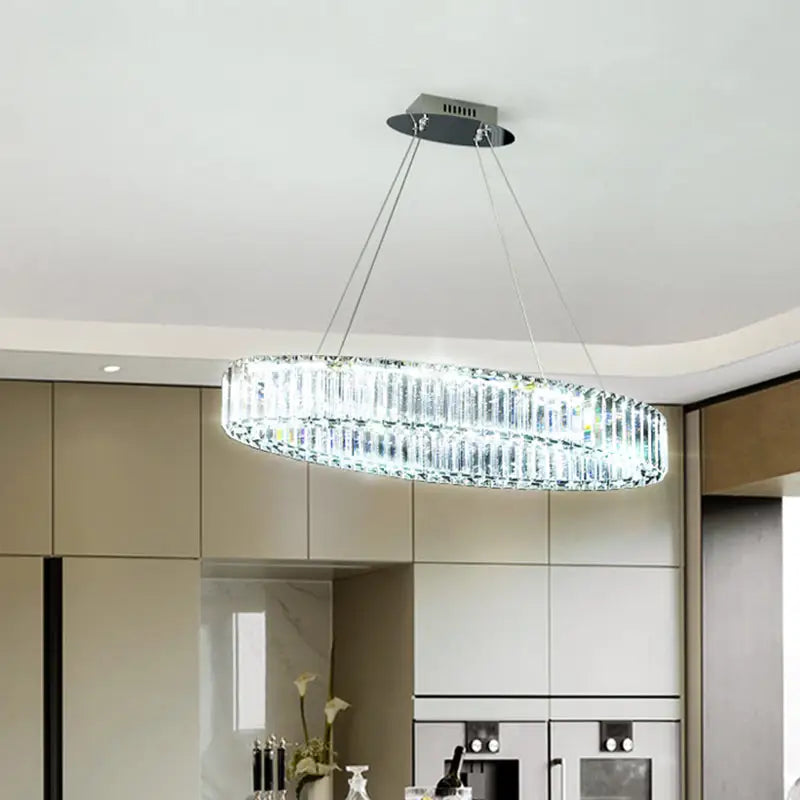 Modern oval-shaped decorbites™ crystal prism hanging lamp with chrome finish and stepless dimming for dining table lighting