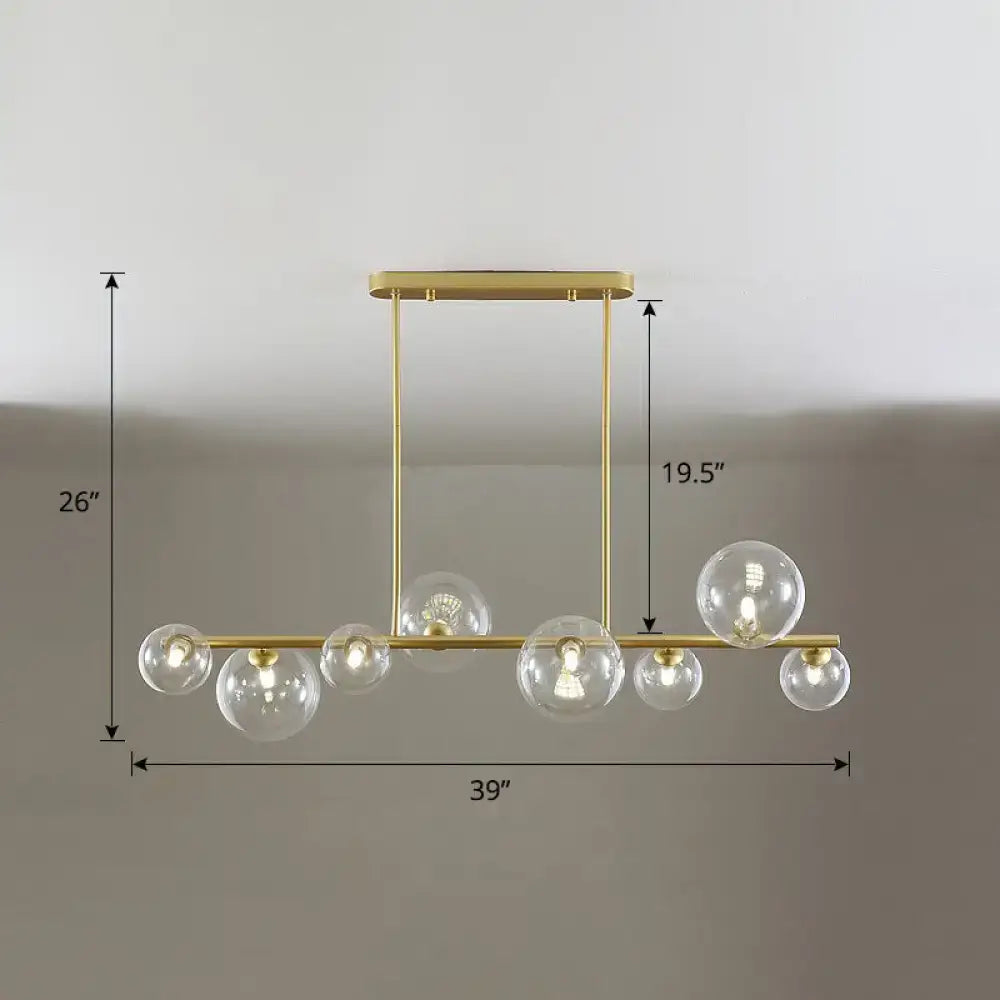 Gold-toned decorbites contemporary pendant ceiling light with clear glass globe bulbs for dining room use