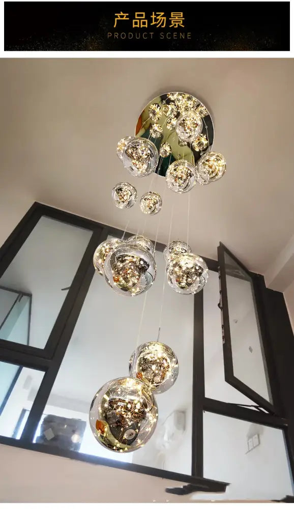 Modern chrome-finished DecorBites™ contemporary crystal ball chandelier with cascading glass orbs for dining room lighting