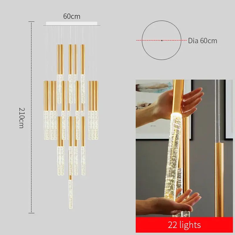 Gold-toned cylindrical DecorBites™ contemporary crystal chandelier with clear accents and 22 embedded lights for staircase